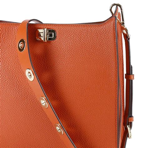 michael kors orange crossbody bag.